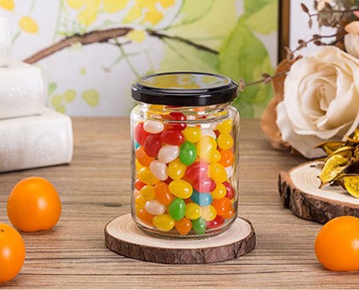 Photograph of real clear glass containers with caps from BC Glass